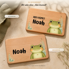 Frühstücksbrettchen mit und ohne Hier-Krümelt-Schriftzug im Vergleich, Motiv Frosch