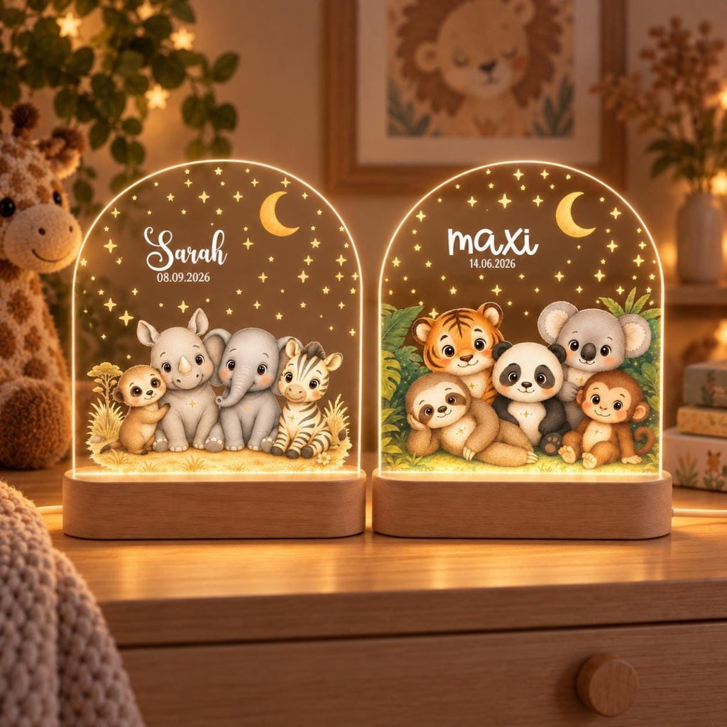 Two safari night lights with Sarah and maxi, glowing in front of giraffe on a chest of drawers